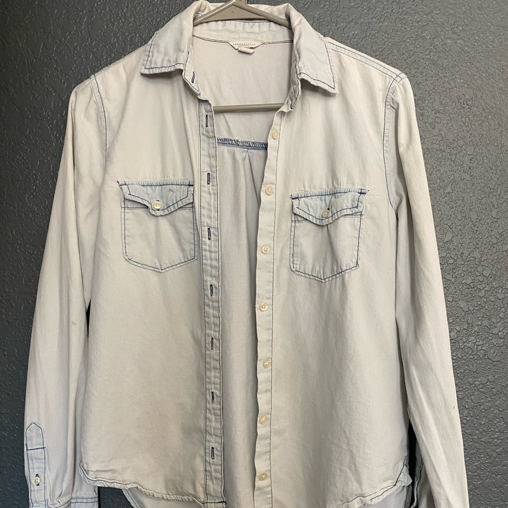 Light blue button up shirt. Size small